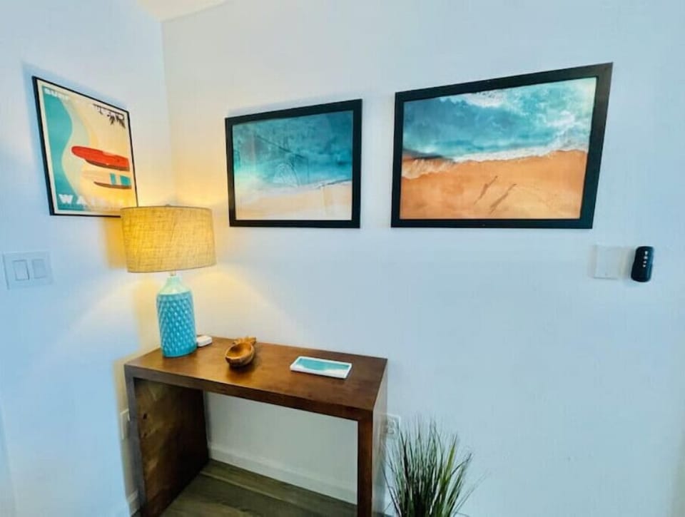 Front hallway. All of the art in our home is sourced from local artists.