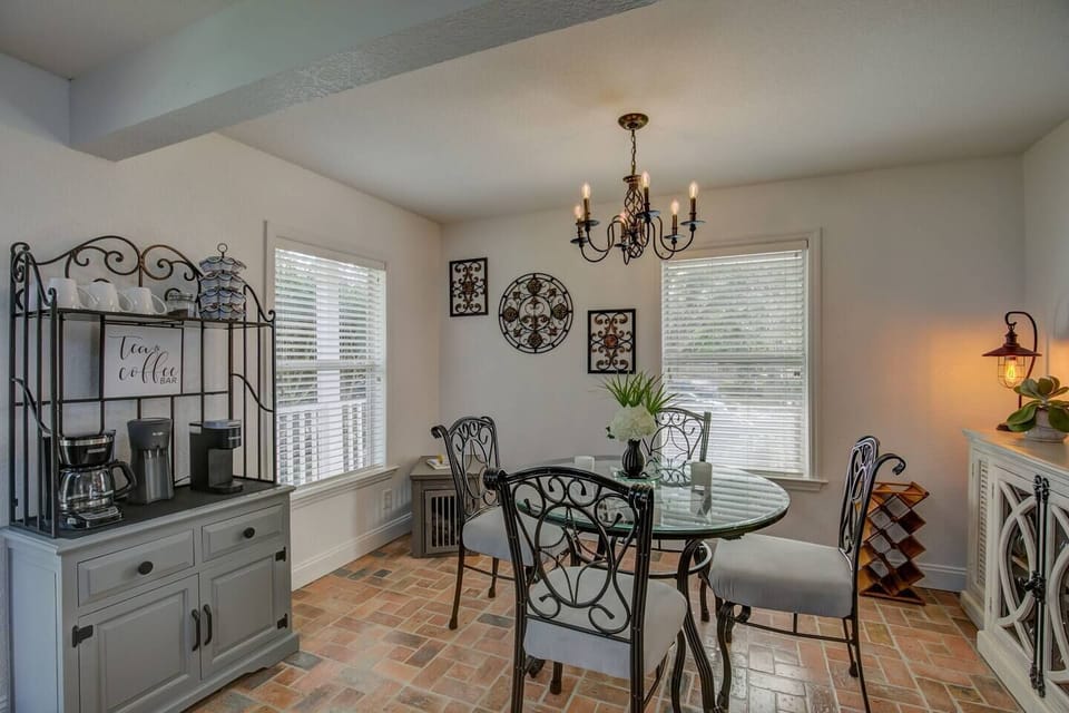Morning coffee, evening wine,  this charming dining nook is where the group slows down and actually talks to each other.