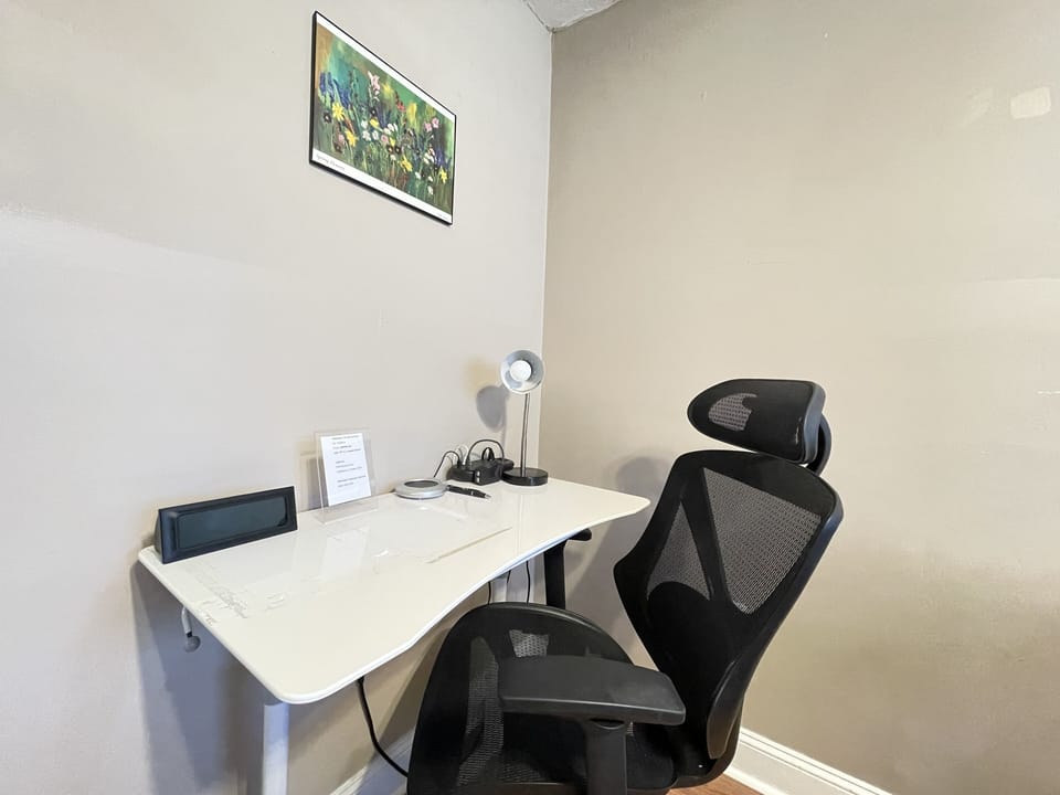 this remote workstation has powerstrip with multiusb ports and coffee mug warmer