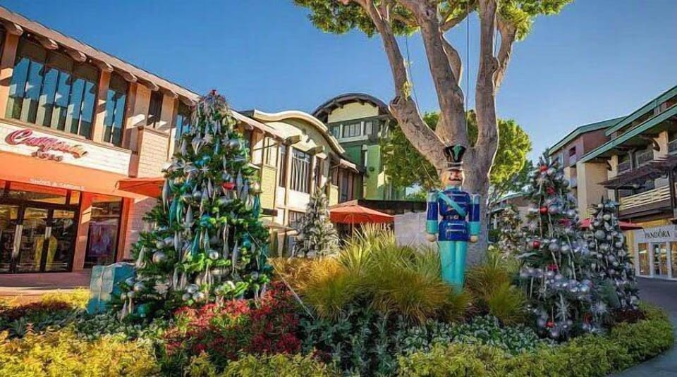 Arrive to a festive courtyard setting steps from shops.