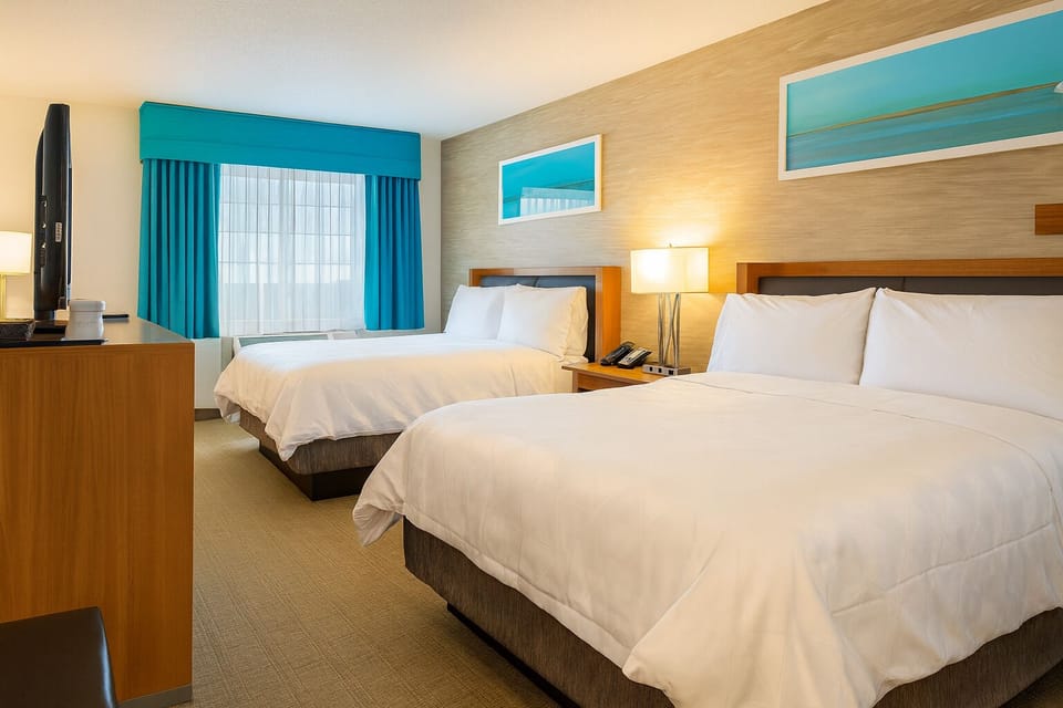 Settle into crisp linens with space for everyone to relax.