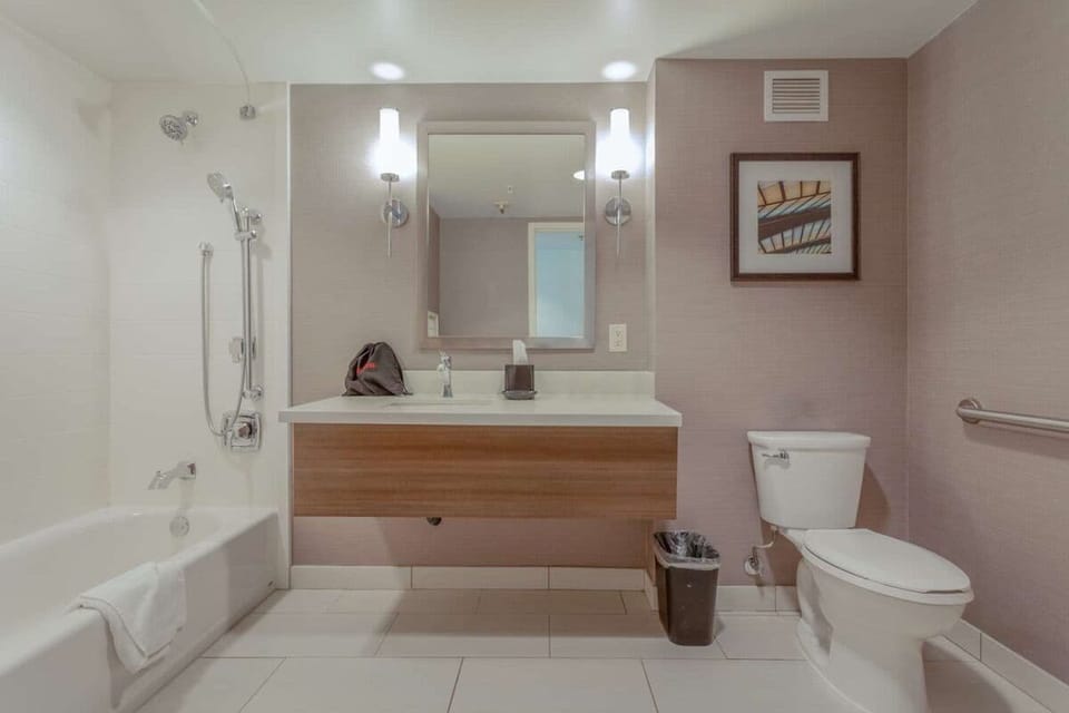 Rinse off and reset in a spotless, spa-like bathroom.