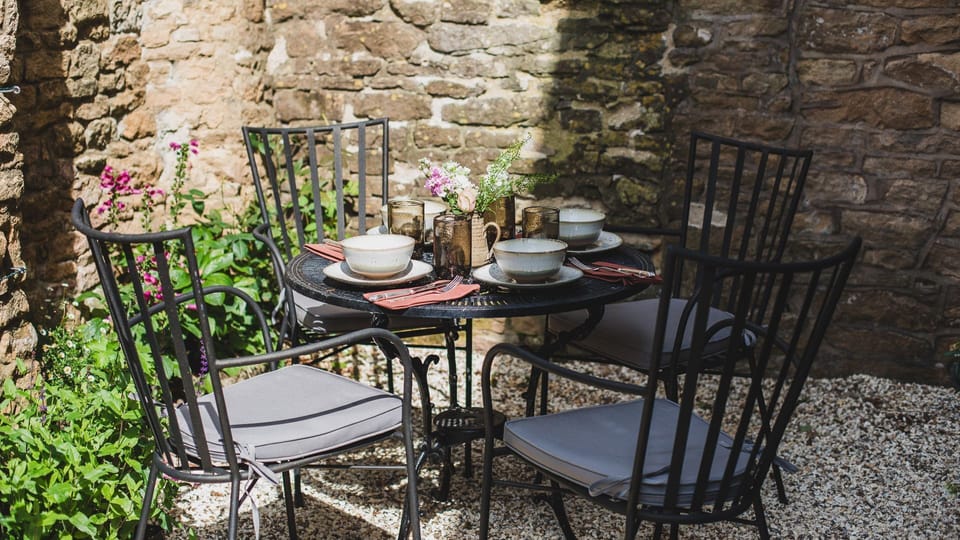 Tucked away behind Armada Cottage is an enchanting walled courtyard.