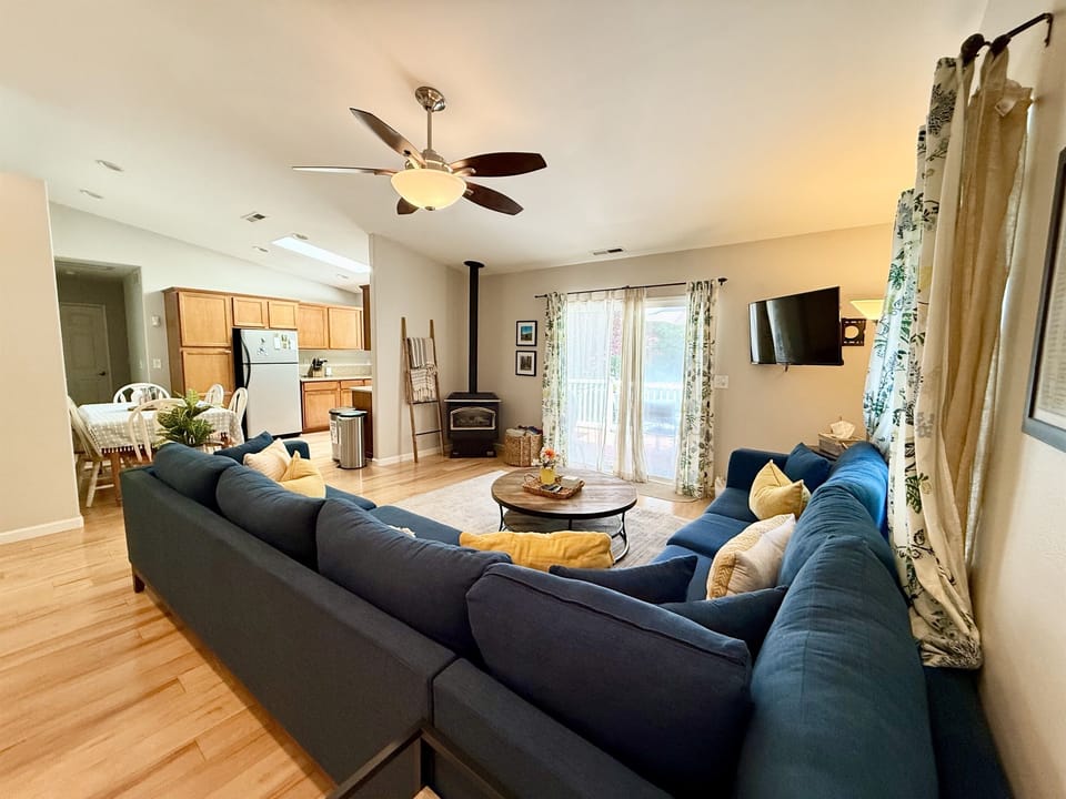 Living room and kitchen in background
