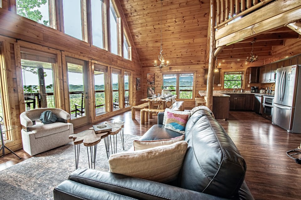 Incredible views from every floor! Large, open concept living/dining/kitchen area makes this the perfect space for family meals and quality time.