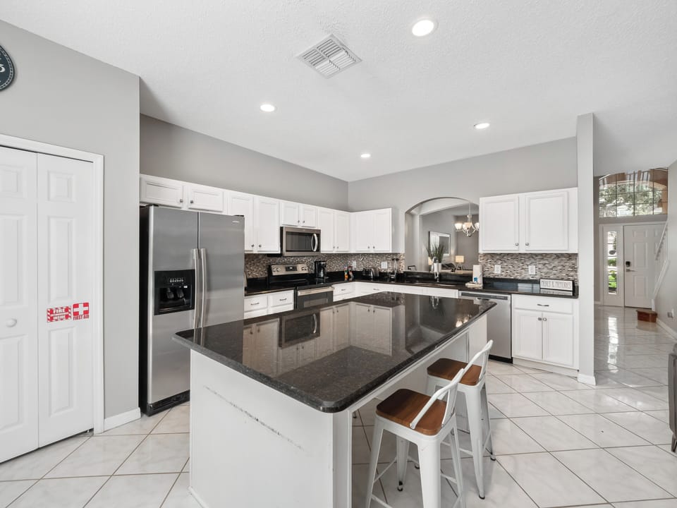 Spacious Full Size Modern Kitchen with Bar Stool Seating