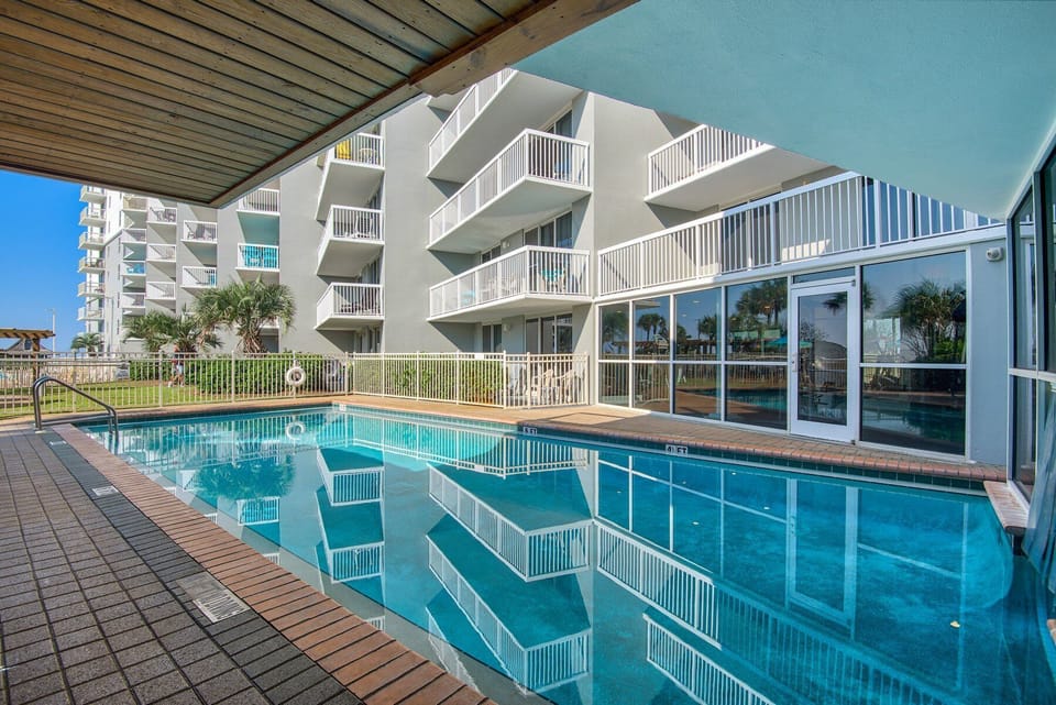 Enjoy a refreshing swim in the outdoor pool, surrounded by beautiful scenery and perfect for sun-soaked days.