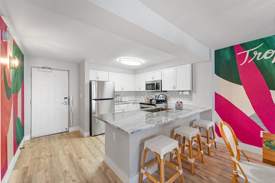 Kitchen with a breakfast bar for 3.