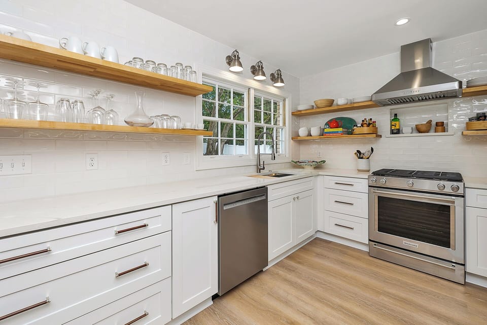 Open shelving with plenty of dishes and glassware 
