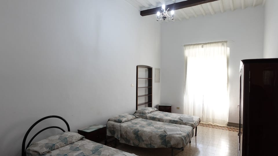 Oasis 2: Relaxation and Historicity in Pisa Apartment in Pisa