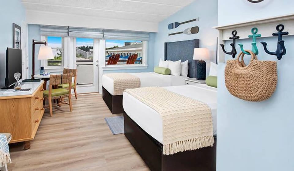Stretch out and unwind in a bright double-queen coastal retreat.