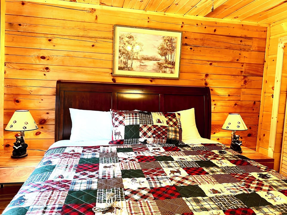 Bedroom #2 with king size bed and 60" TV