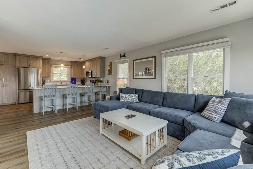 Top-Level Living Room with Deck Access