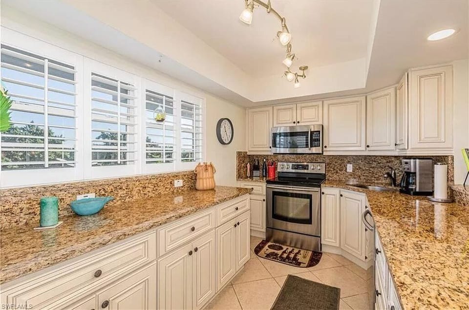 Update kitchen with granite & stainless appliances.