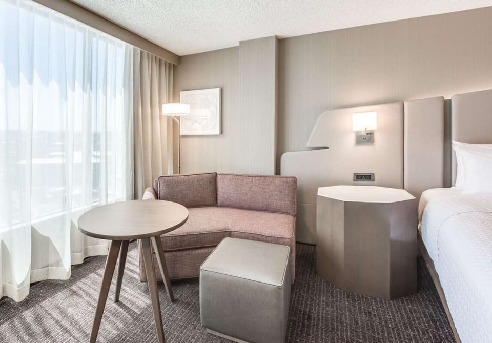 Lounge by the window with coffee in a cozy nook.