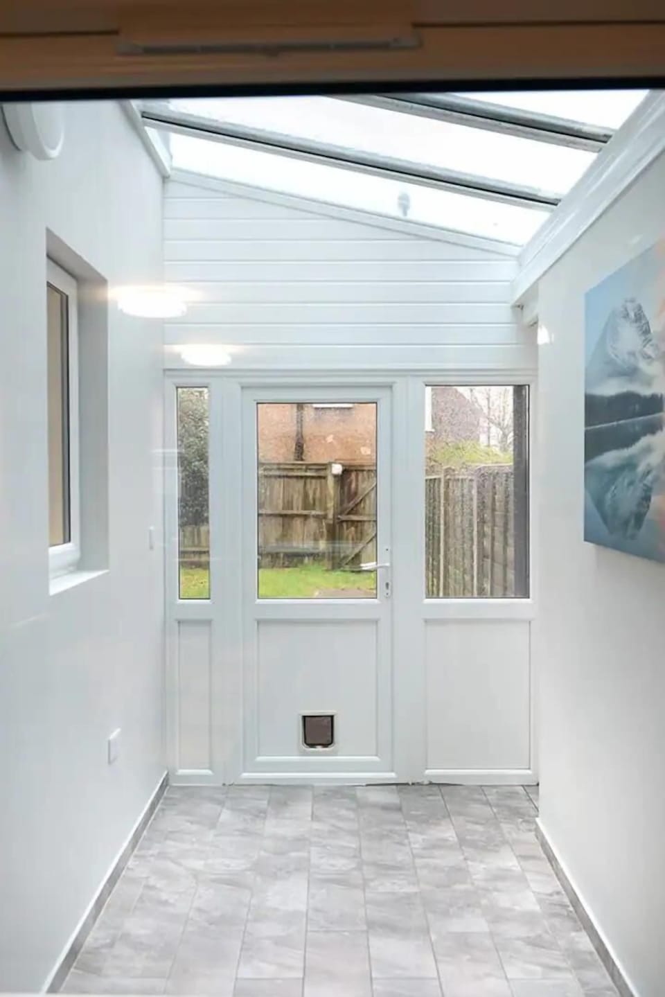 Seamless transition to a serene lawn space for a breath of fresh air.