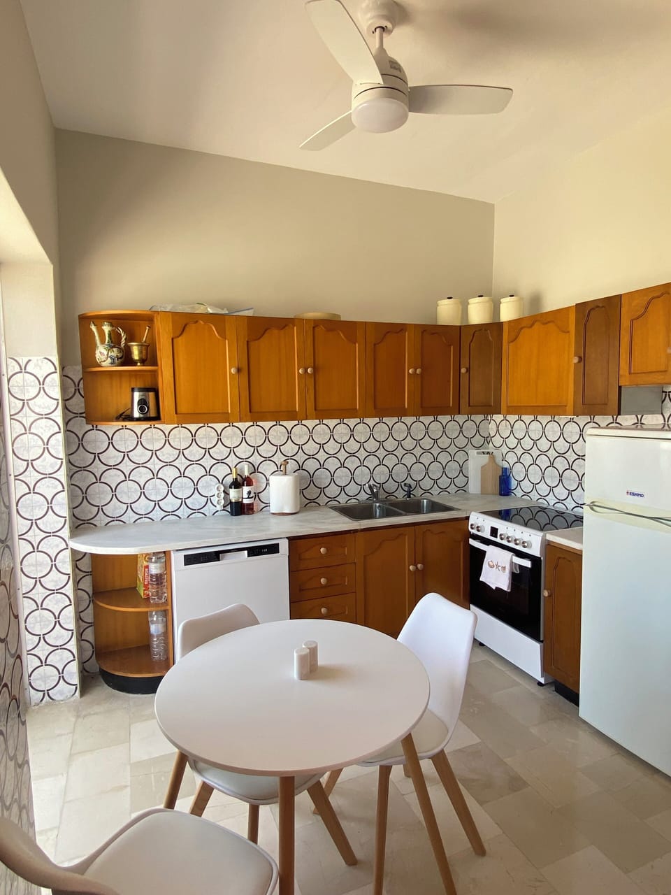 Fully stocked eat in Kitchen includes DW and free standing oven.