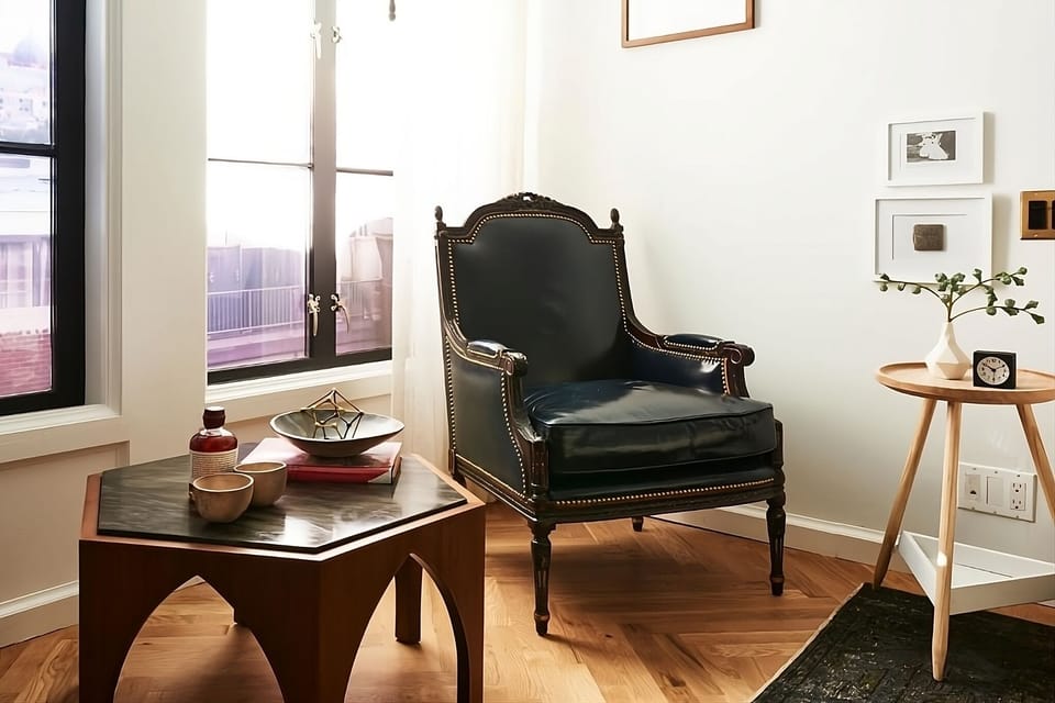 Relax in a stylish sitting area with warm natural light.
