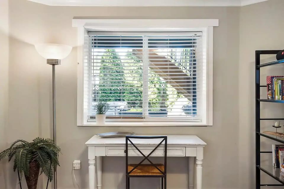 Dedicated work space in front of large window over looking back yard.