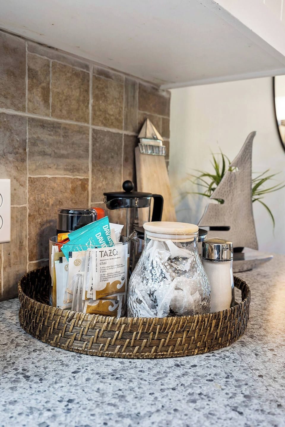 French press, coffee grinder, drip coffee machine & teapot with specialty teas. 
