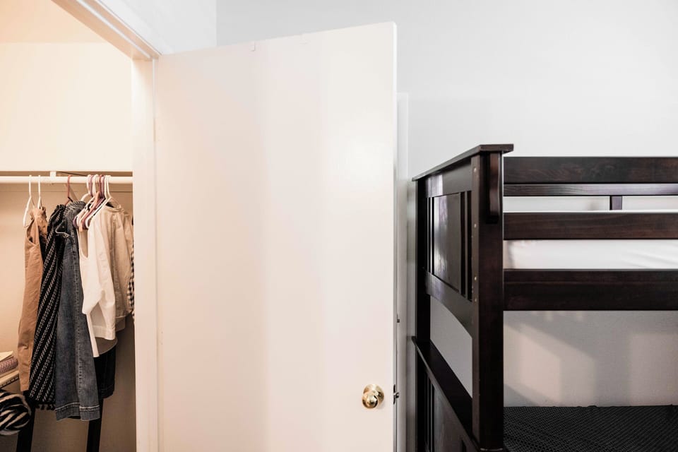 Walk-in closet in second bedroom