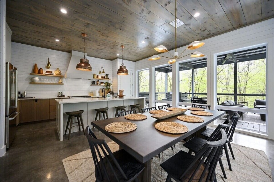 Dining Room: Gather around for delicious meals with stunning views through expansive windows!
