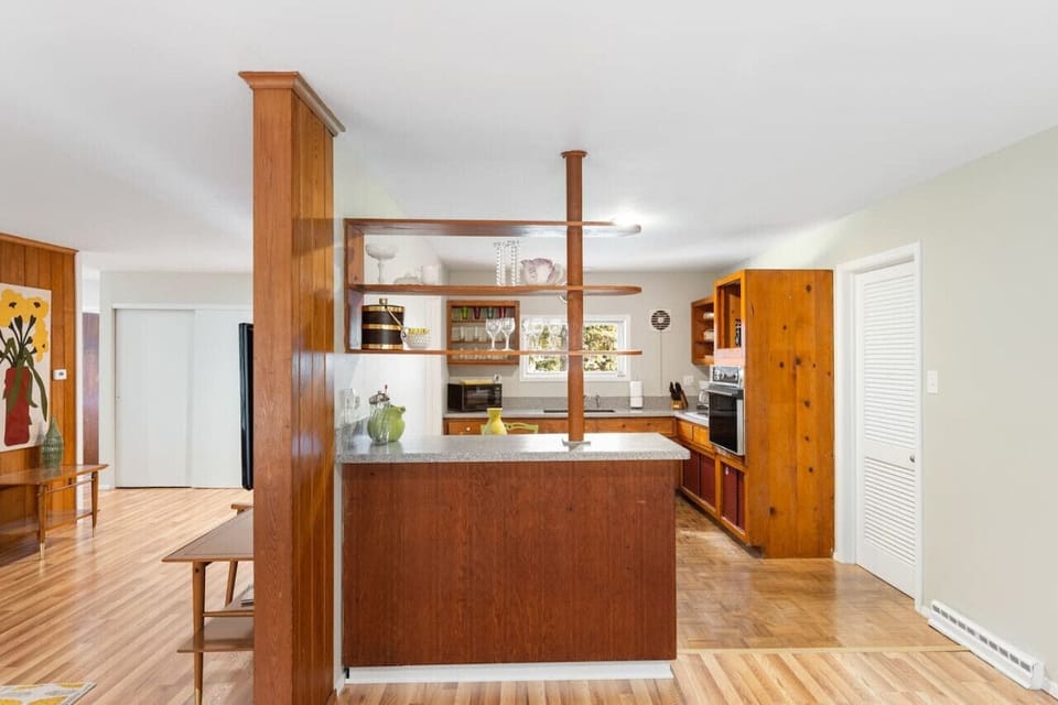 Side view of fully equipped kitchen
