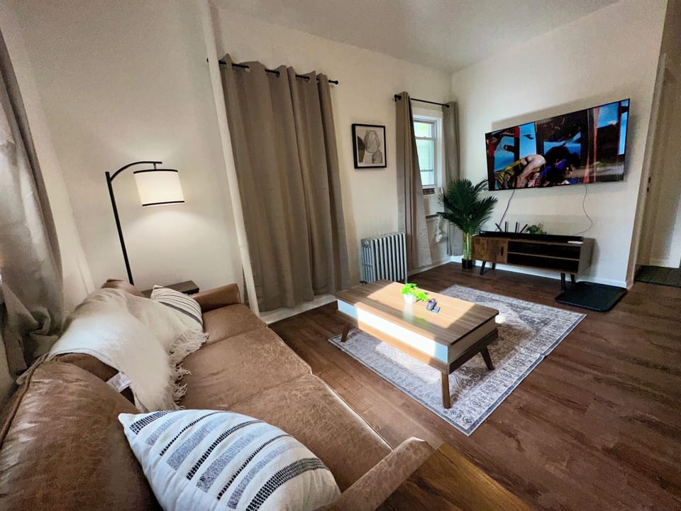 55" Smart TV, Pull out coffee table, sound bar, air conditioner