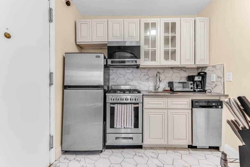 Fully equipped kitchen near front entrance