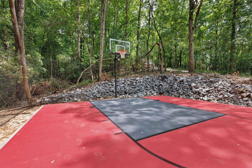 Brand new basketball court equipped with evening lighting. 