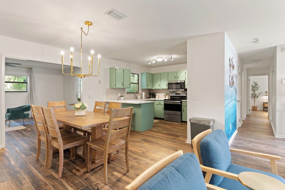 Dining area open to both living rooms and kitchen