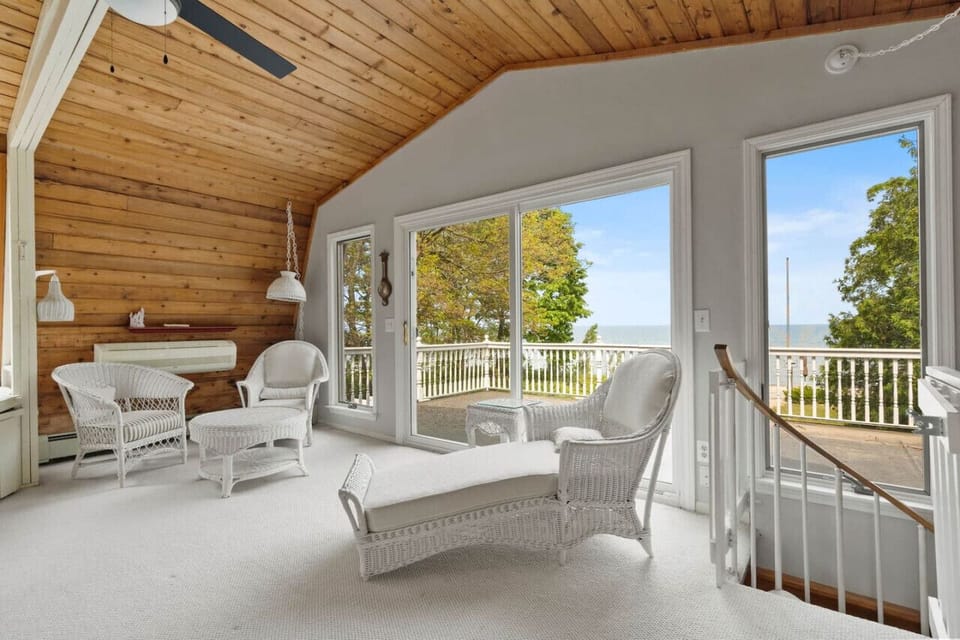 Upstairs living room with even more gorgeous views (please note deck is not usable)
