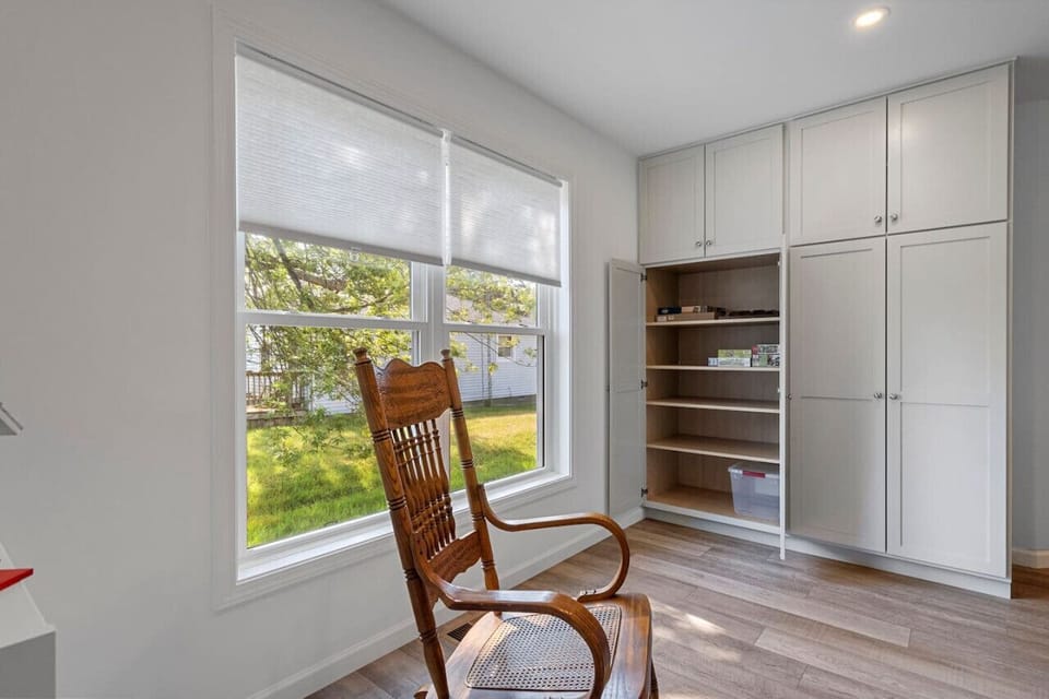 A space to rock the baby to sleep and games for the kiddos to enjoy