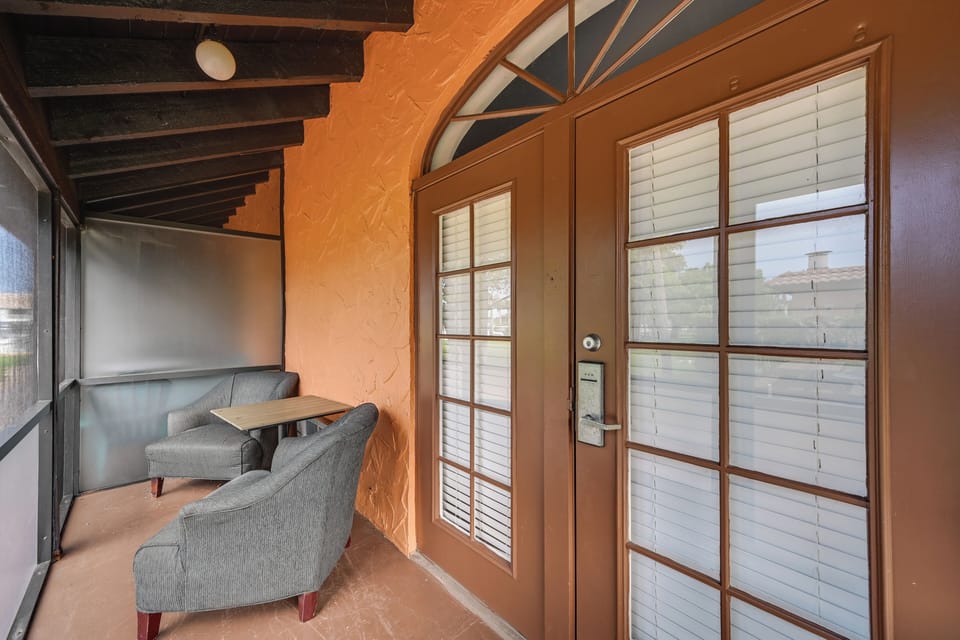 Unit Entrance | Screened-In Porch