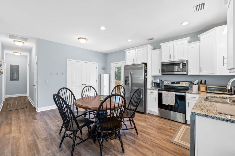 Laundry room and pantry space opposite kitchen