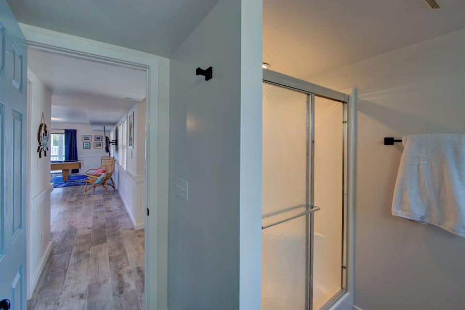 1st floor bathroom w/ shower & shared w/ 1st floor bedroom and game room
