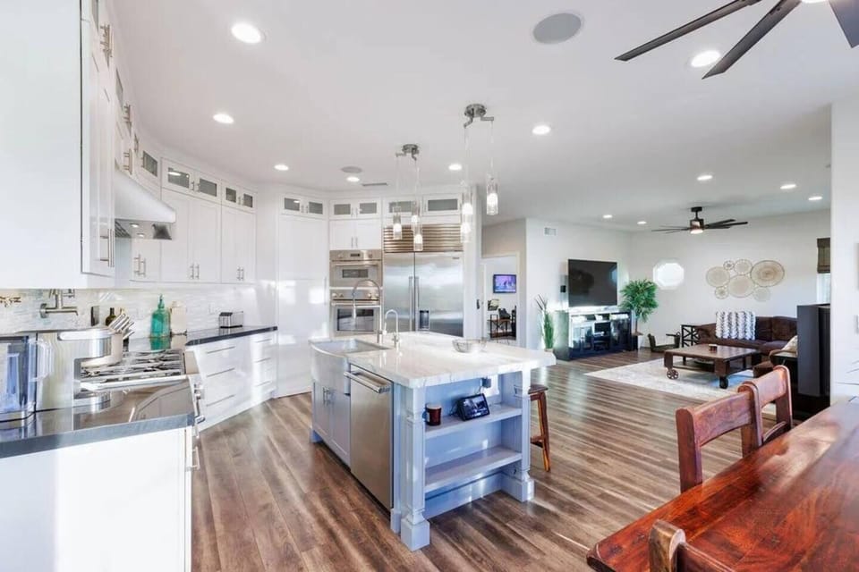 Fully remodeled Gourmet Chef's Delight Kitchen. Triple stack professional grade Thermador ovens, 6 burner stove, pot filler, and large island.  Perfect for the family cook, and entertaining!