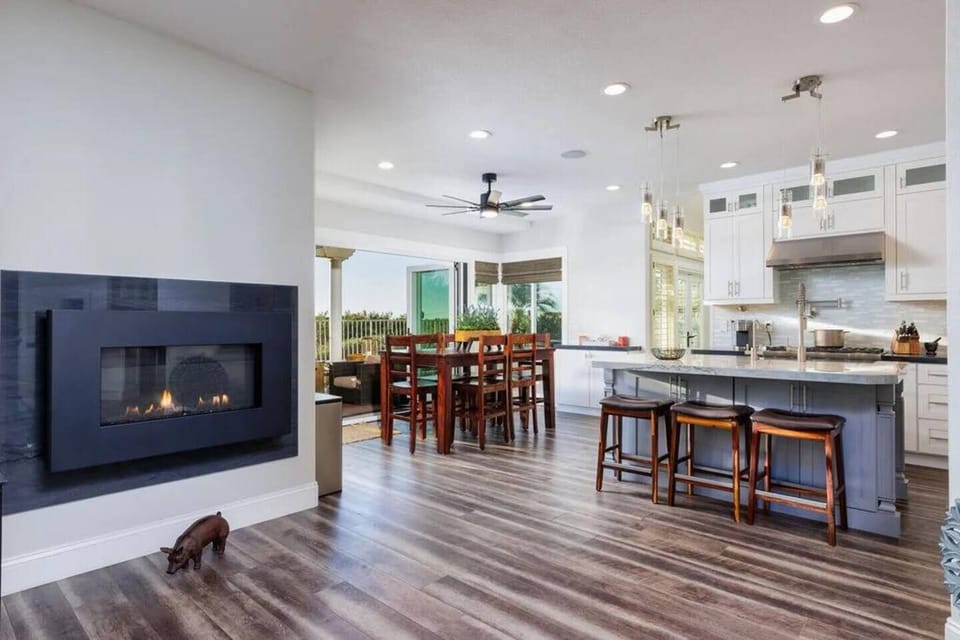 Large kitchen dining area over looking the stunning backyard views of Lake Mission Viejo. Extend your entertaining to the back yard with California style patio door. 