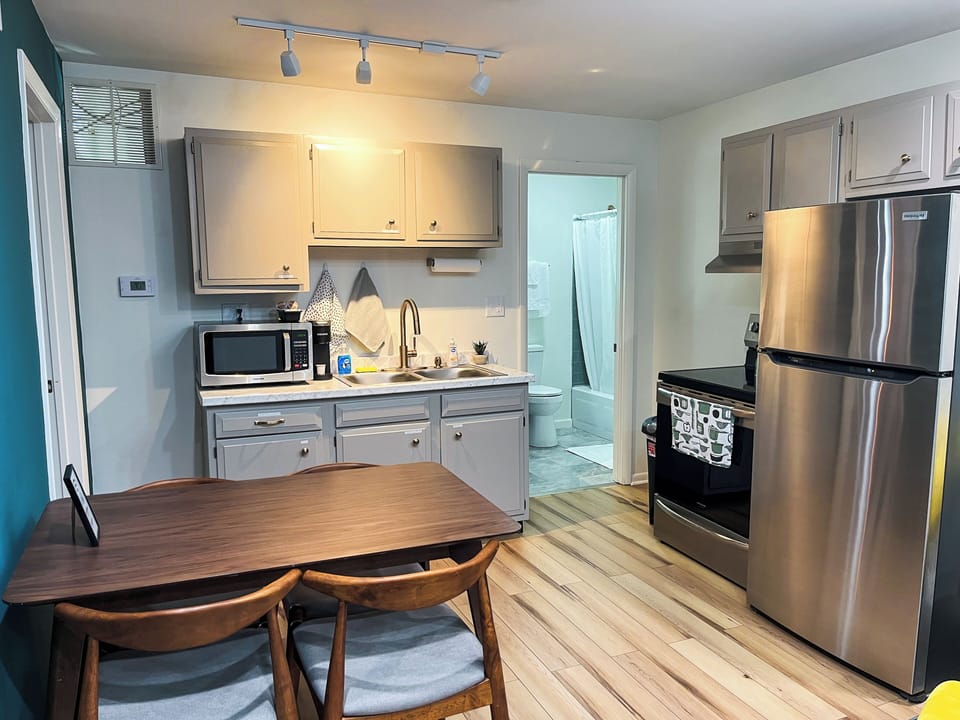 We've stocked the kitchen with a comprehensive set of cookware, including pots, pans, baking trays, and various cooking utensils. You'll find everything you need to whip up a feast.