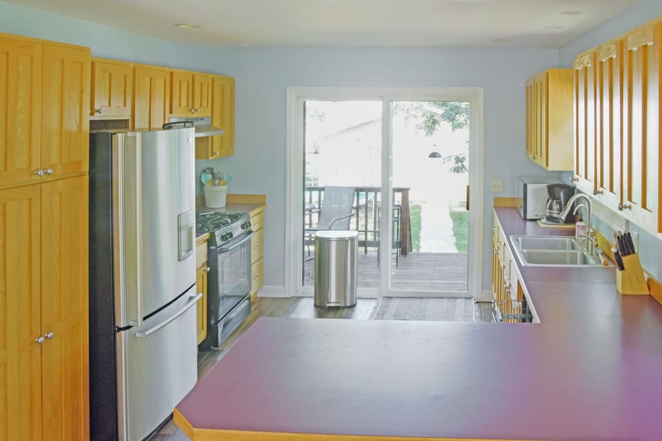 Kitchen leading to deck