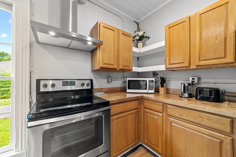 Kitchen w/oven & equipment. Drawers feature fully equipped cookware utensils