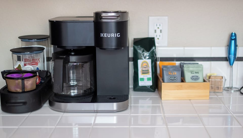 The coffee/tea bar has a Keurig that can make a single cup or a full pot of coffee. There's also a water kettle for the tea and hot cocoa drinkers.