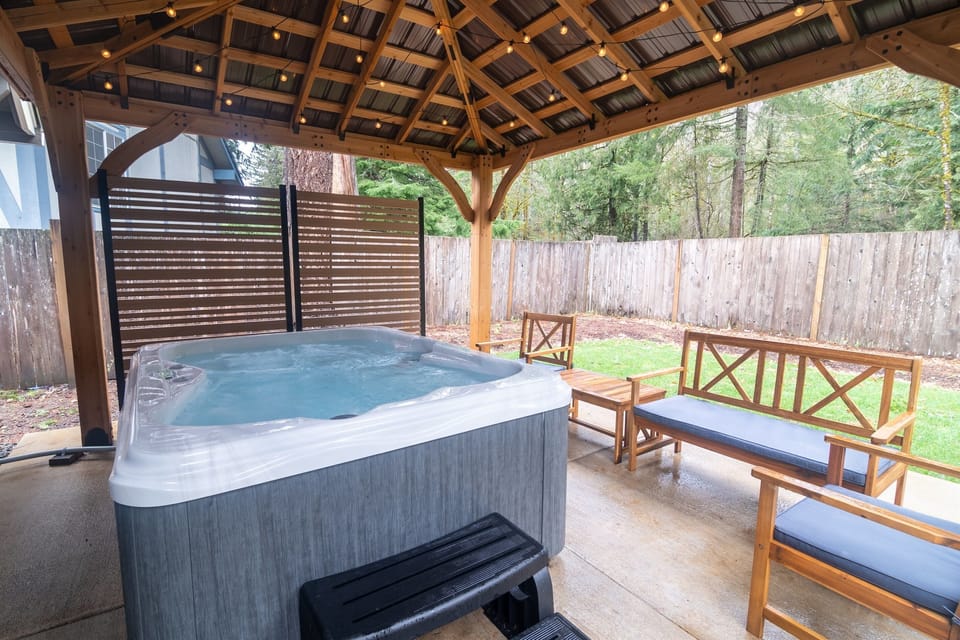 Enjoy a dip in our new four-person hot tub or just sit in the outdoor space with friends!