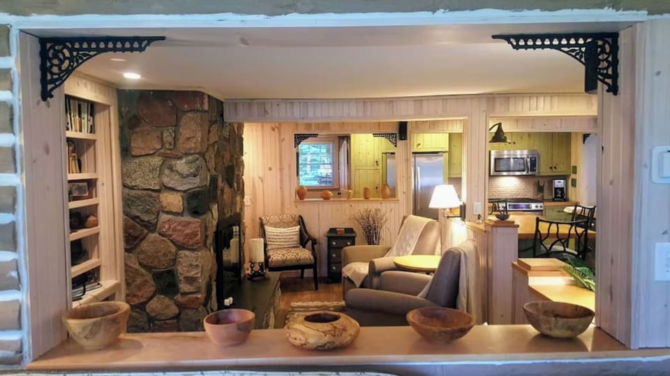 View of living room from sunroom in main cabin