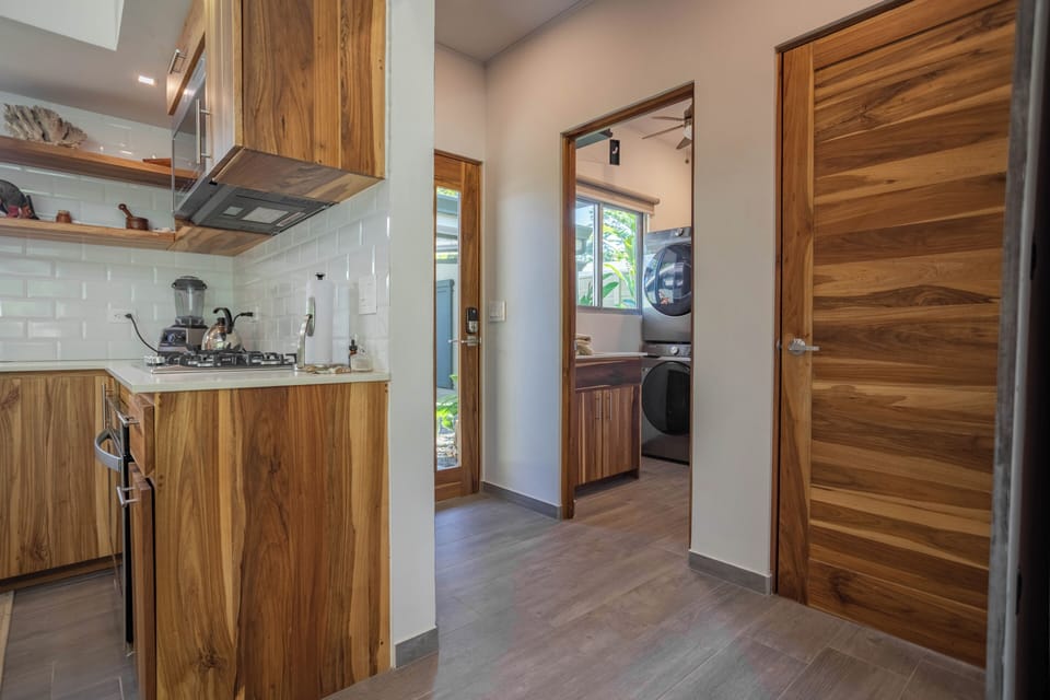 Entrance with Laundry room, Public Bathroom and Kitchen