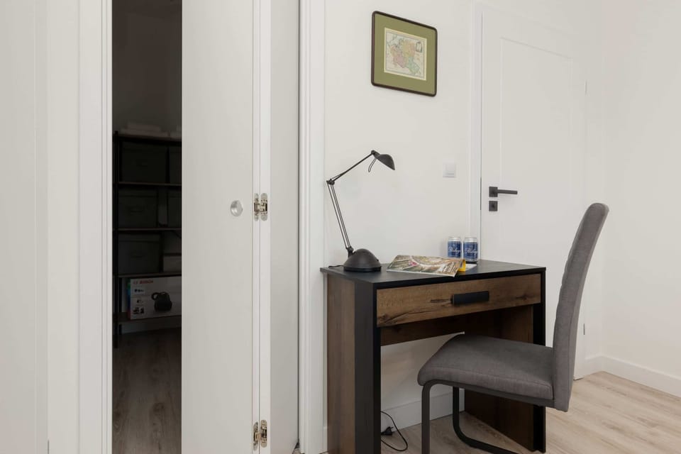 The bedroom's elegant decor creates a serene and restful environment.