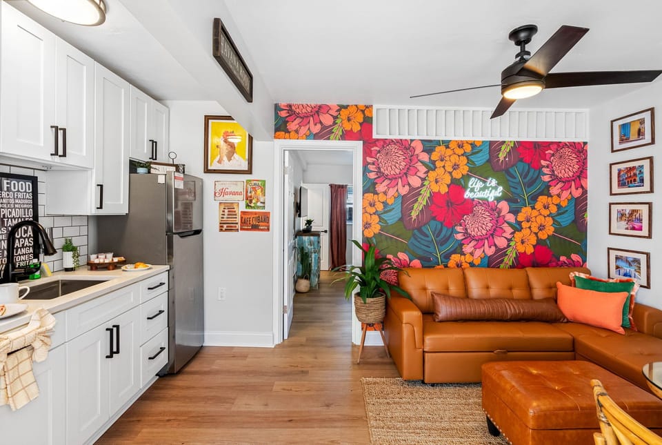 The interior is adorned with warm earth tones, vibrant accents, and handcrafted décor that pays homage to Miami’s cultural melting pot.