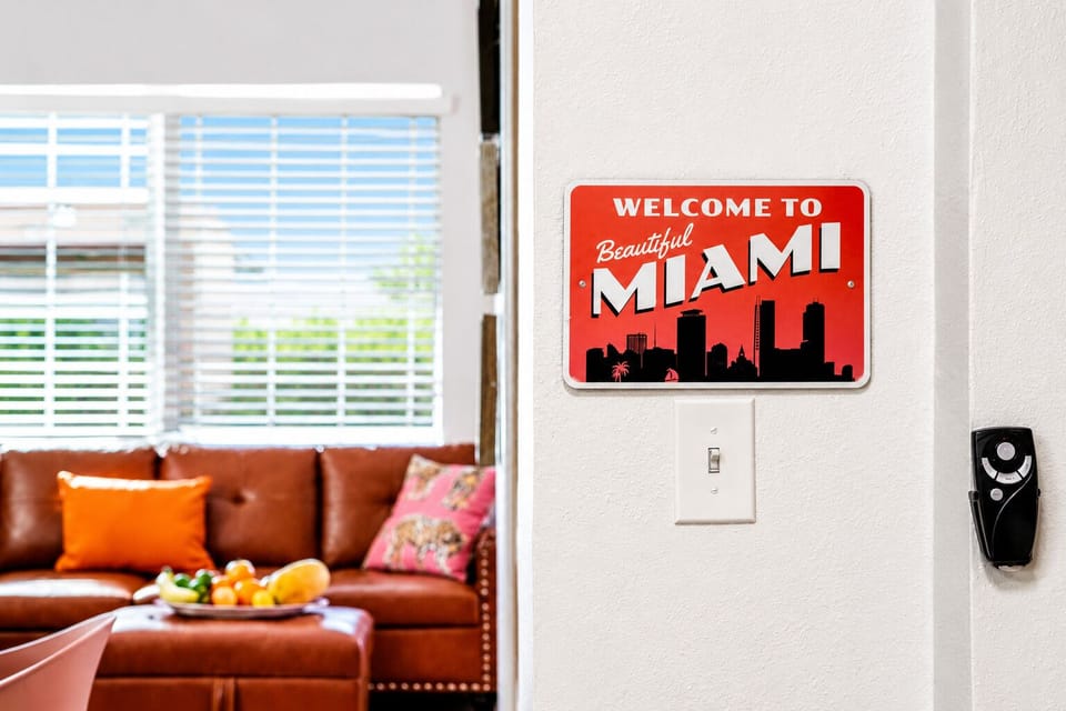 Start your vacation the moment you arrive! A cheerful Miami-inspired welcome greets you as you step into this colorful beach retreat, setting the tone for a fun and relaxing stay.