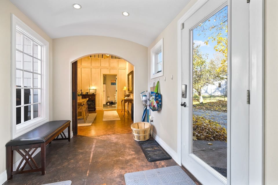 Hallway leading to large bedroom suite on first floor