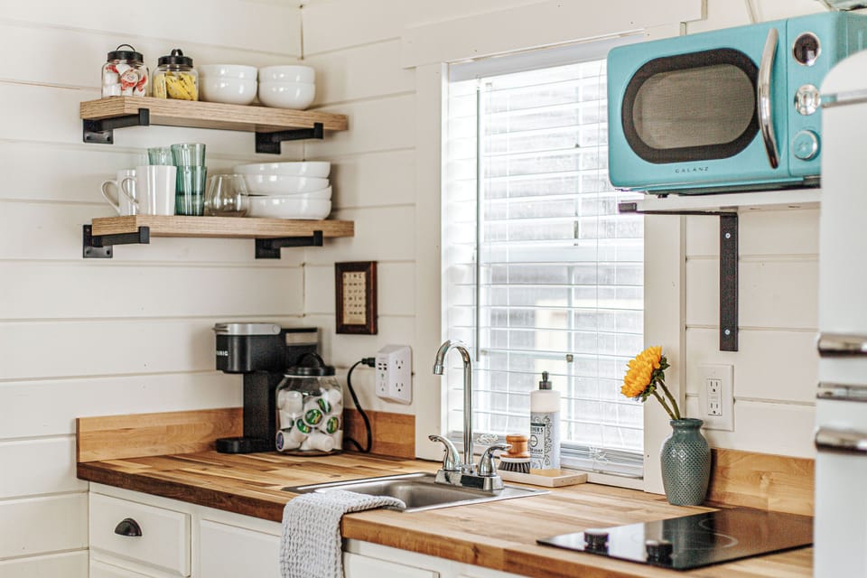Perfect kitchen has everything you need including full size microwave, fridge